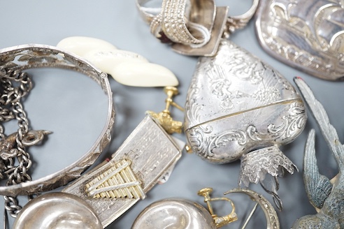 A 19th century 800 white metal heart shaped box, 63mm and a small grouop of other white metal items and costume jewellery.